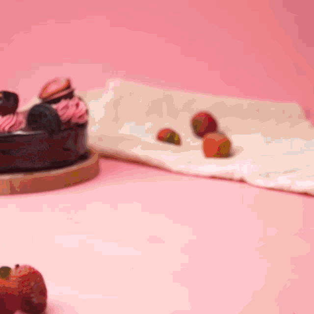 a slice of cake with strawberries and oreos on it