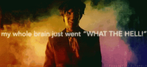 a man in a suit and tie is standing in front of a colorful background with the words `` my whole brain just went ''