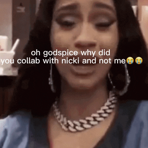 a woman wearing a necklace and earrings is crying with the caption oh godspice why did you collab with nicki and not me
