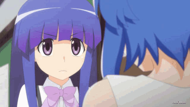 a girl with purple hair is looking at a boy