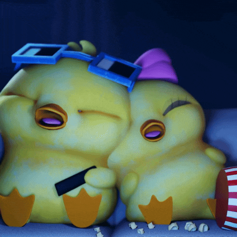 a couple of cartoon chickens are sitting on a couch eating popcorn