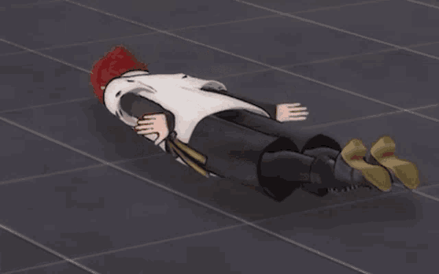 a person is laying on their back on the floor .