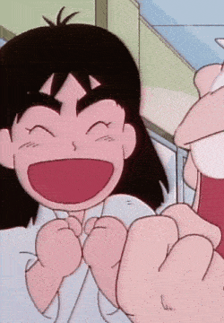 a close up of a cartoon character with a big smile on his face and a fist in the air .