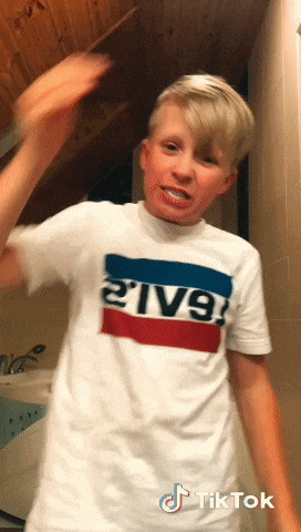 a boy wearing a shirt that says 2iv9