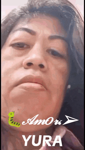 a close up of a woman 's face with the words amor yura on the bottom