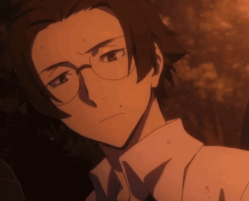 a close up of a person 's face with glasses and a white shirt