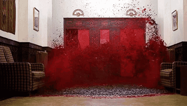 a room with a lot of blood coming out of the door