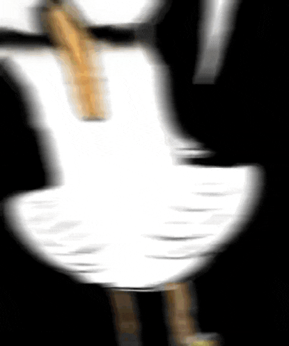 a blurry picture of a person in a white dress with a tie .