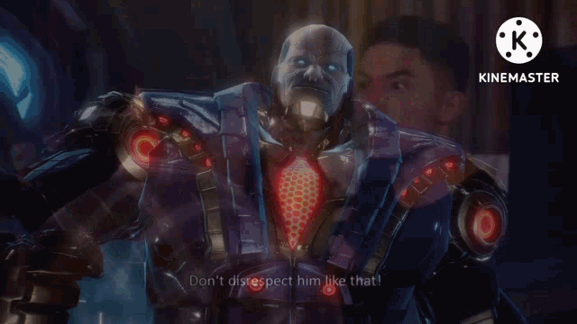a video of a man holding a shield with the letters k on the bottom