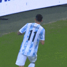 a soccer player with the number 11 on the back of his shirt
