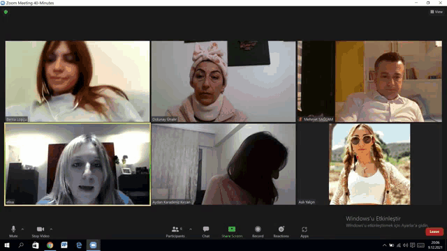 a group of people are having a zoom meeting and one of the participants has a picture of herself on her screen