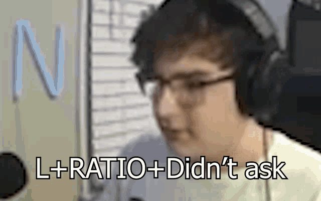 a man wearing headphones and glasses with the words l + ratio + did n't ask