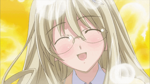 a girl with blonde hair and glasses is smiling with her eyes closed