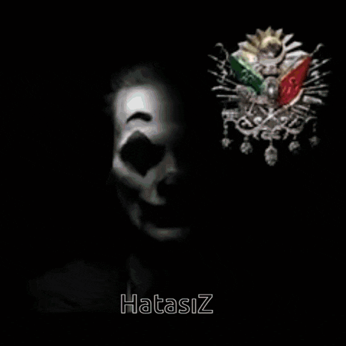a clown is standing next to a picture of a coat of arms with two flags on it .