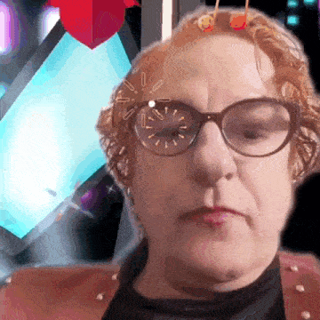 a woman wearing glasses has a clock drawn on her face