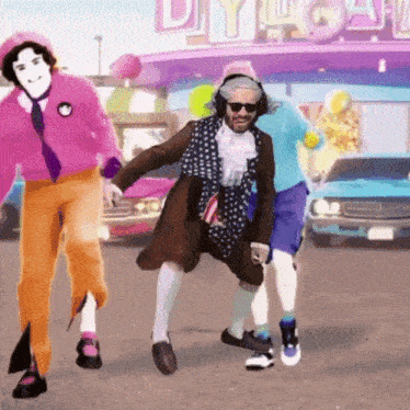 a group of people are dancing in front of a sign that says ' dyl ' on it