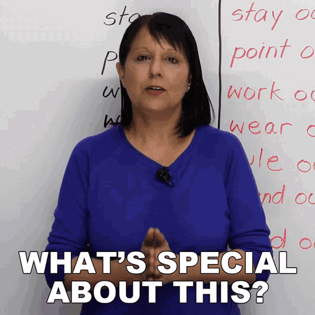 a woman stands in front of a white board with the words " what 's special about this "