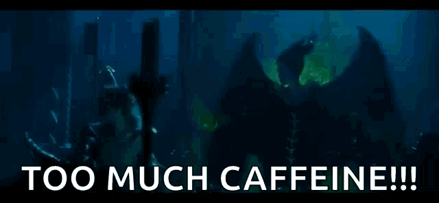 a picture of a dragon with the words `` too much caffeine !! '' written on it .