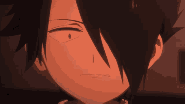 a close up of a cartoon character 's face with a red eye