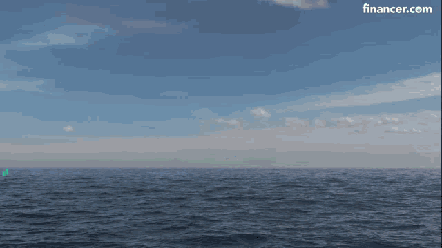 a picture of an explosion in the ocean with a financer.com logo in the corner