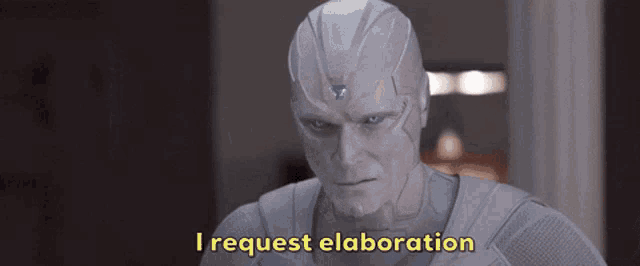 a close up of a man in a superhero costume says i request elaboration .