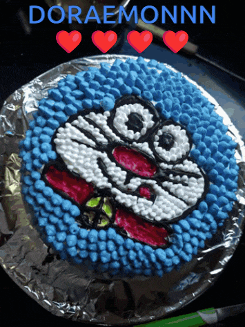 a cake with doraemonnn written on the top