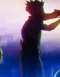 a silhouette of a person standing in the water with a sunset in the background