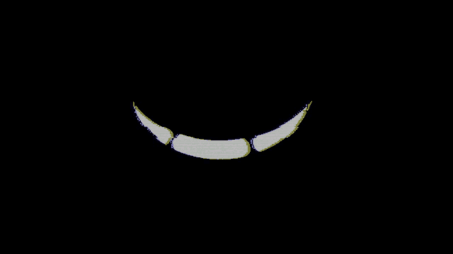 a close up of a smiley face on a black background