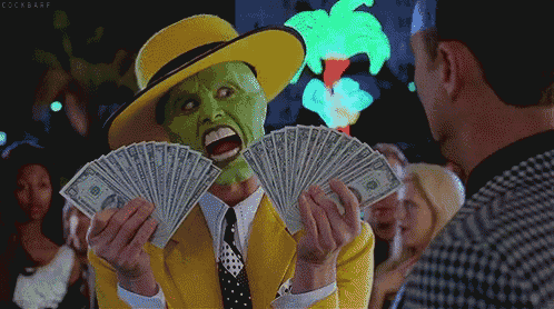 a man wearing a mask is holding a fan of dollar bills