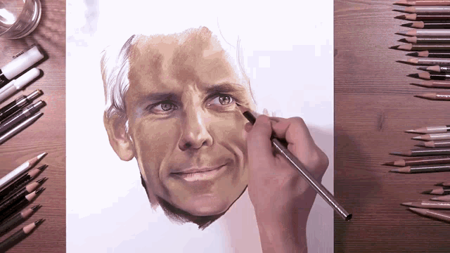 a person is drawing a man 's face with a pencil that says prismacolor on it