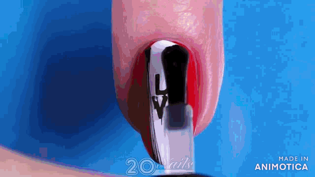 a close up of a person 's nails with the words made in animatica