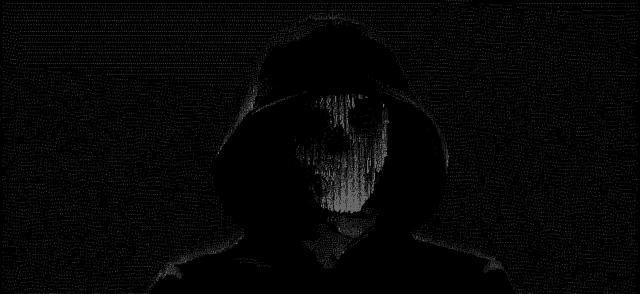 a black and white photo of a person wearing a hooded jacket .