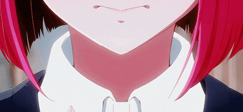 a close up of a girl with red hair