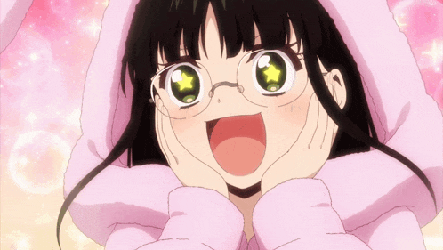a girl wearing glasses and a pink bunny hood