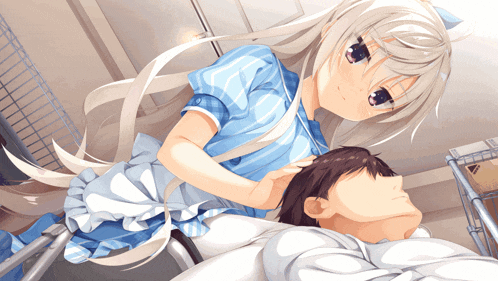 a girl in a blue dress is laying on a man 's back