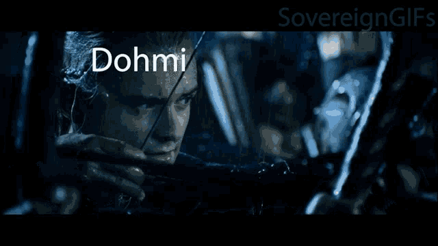 a man holding a bow and arrow in the rain with the words dohmi written on his face