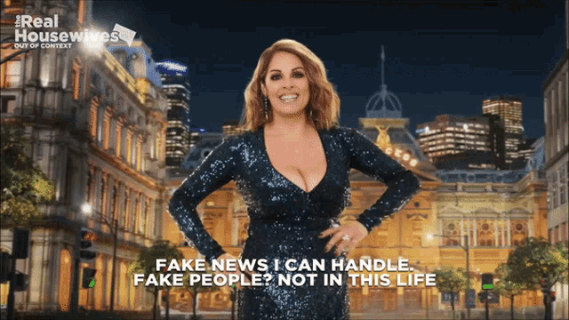 a woman in a sequined dress says fake news i can handle