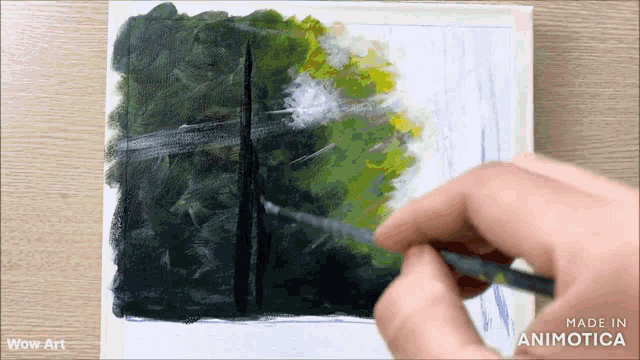 a painting is being painted on a canvas and the words wow art are on the bottom right