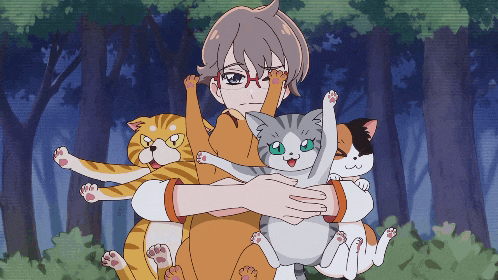 a girl with glasses is holding a cat in her arms in a forest