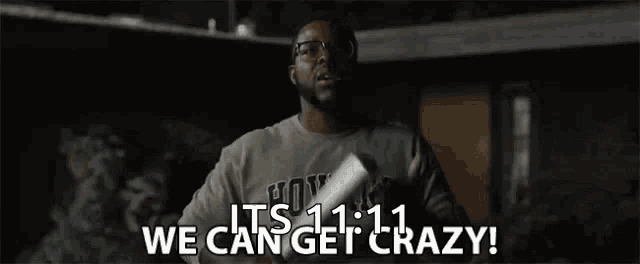a man with glasses is holding a baseball bat and says `` we can get crazy '' .