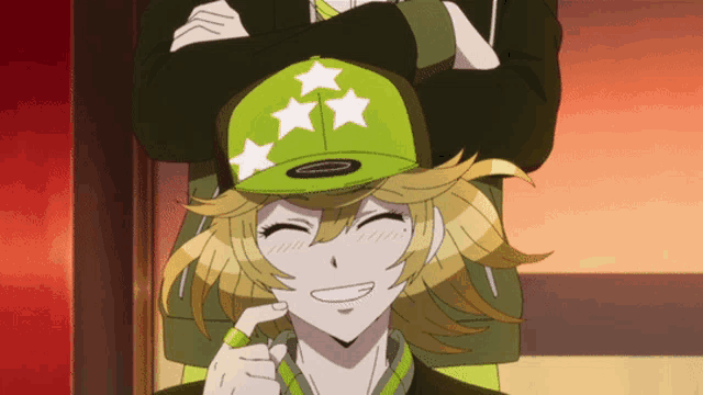 a girl wearing a green hat with three white stars on it