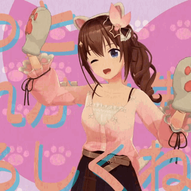 a girl wearing a cat ear headband and paw gloves on a pink background