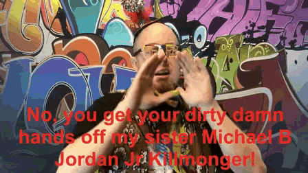a man in front of a graffiti wall says no you get your dirty damn hands off my sister michael