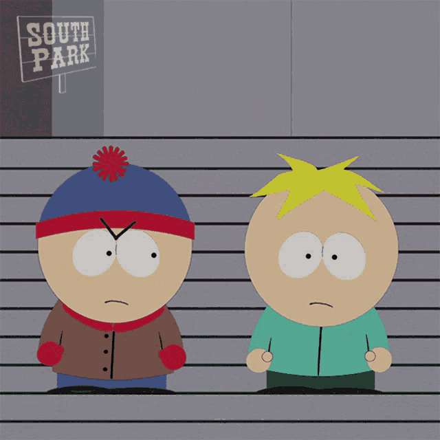 stan and butters from south park are standing in front of a sign that says south park