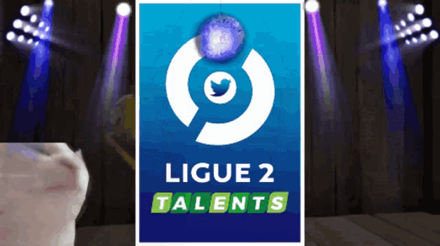 a blue sign that says ligue 2 talents in green