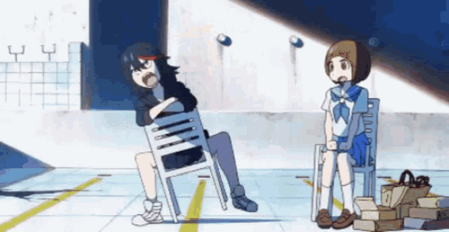 a girl is sitting on a chair next to a man