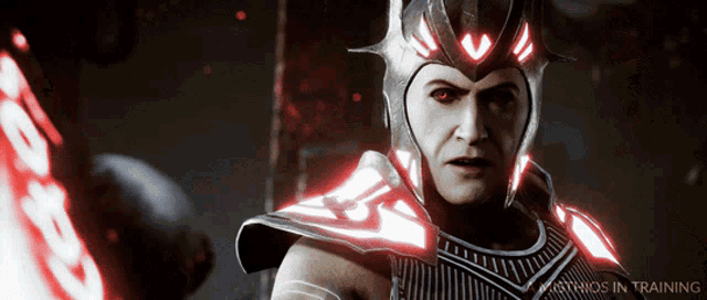 a man wearing a helmet with red eyes and the words mythos in training behind him