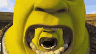 shrek from the movie shrek with his mouth open and teeth showing