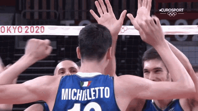 a volleyball player with the name michiletto on the back of his shirt