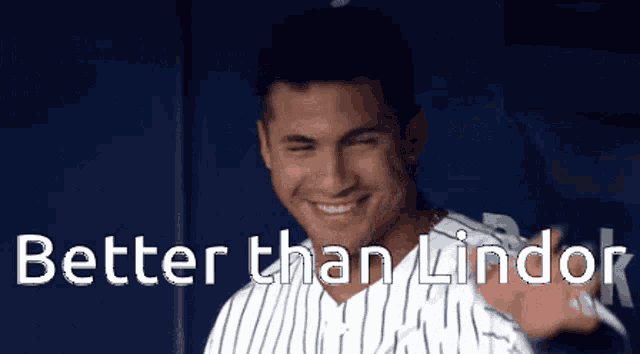 a man in a striped shirt with the words better than lindor behind him